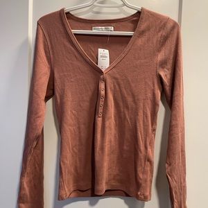 Long sleeve half button tee